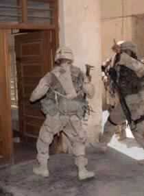 Resistance Continues in Iraq as Rumsfeld Needs More Forces