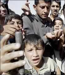 Iraqi Governing Council Member Dies, UN Cuts Staff in Baghdad