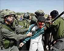 Palestinians Beaten for Resisting Barrier